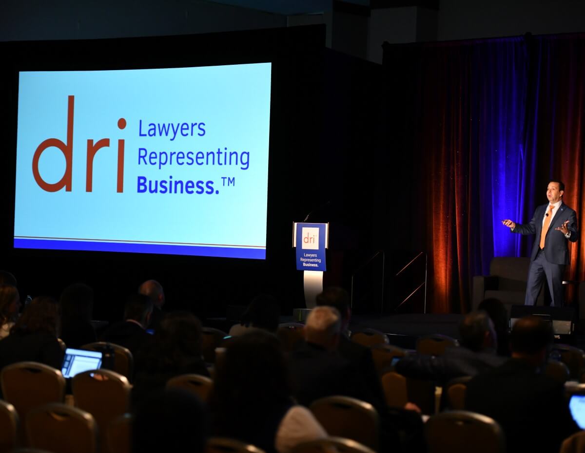 Speaker on stage during Annual Meeting