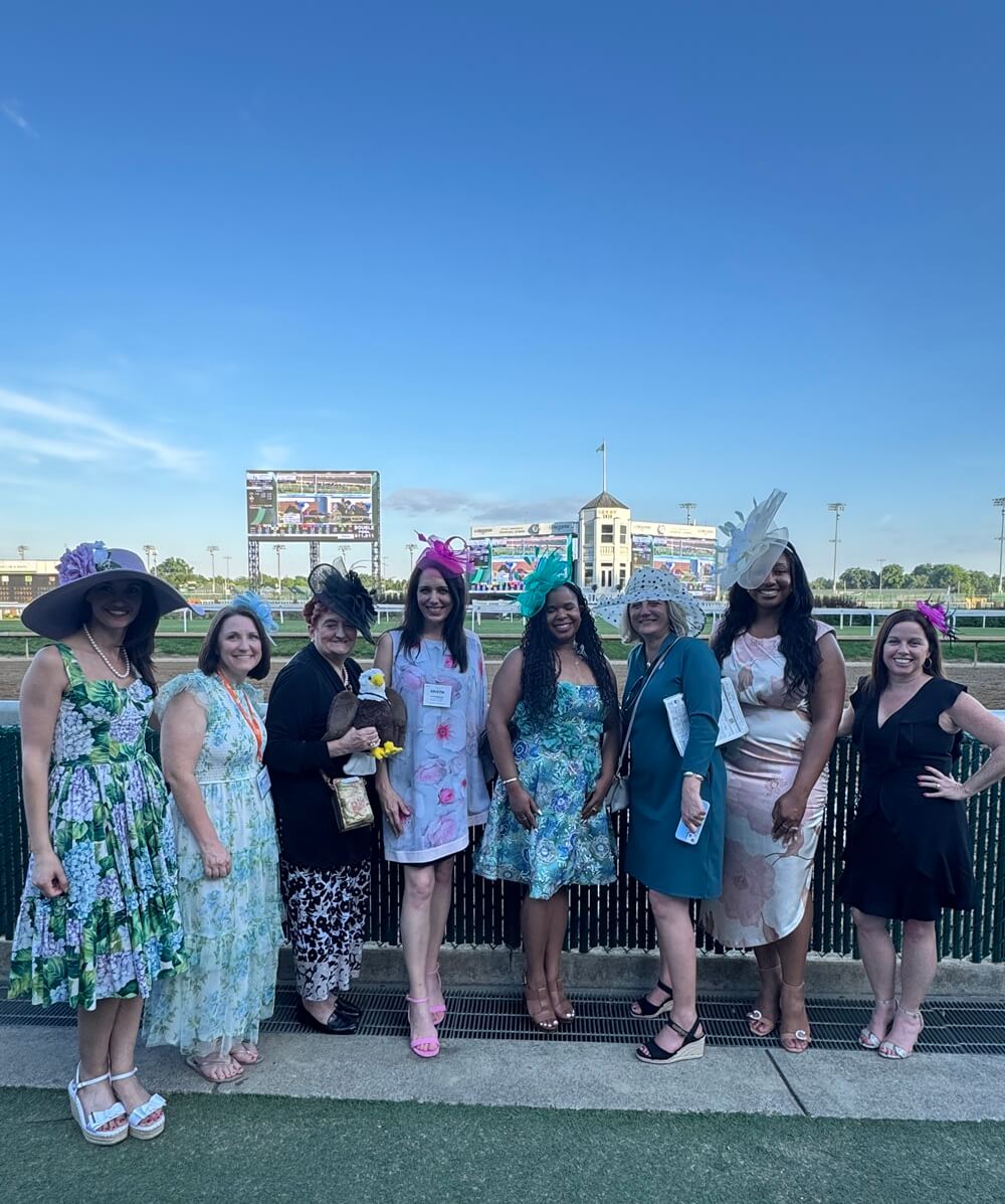 Group photo at Churchill Downs in Louisville, Kentucky