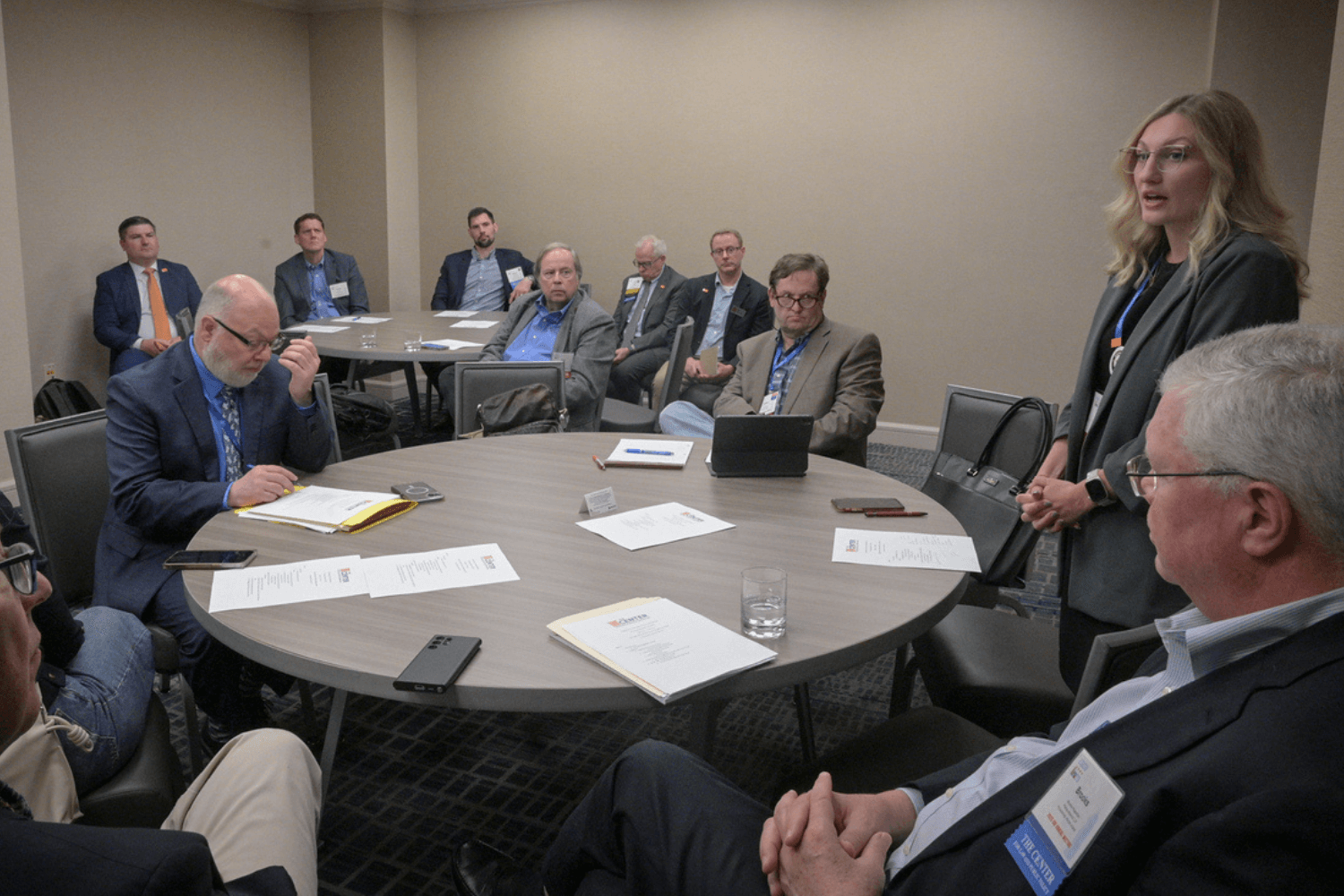 Roundtable in groups of five people staying informed and connected