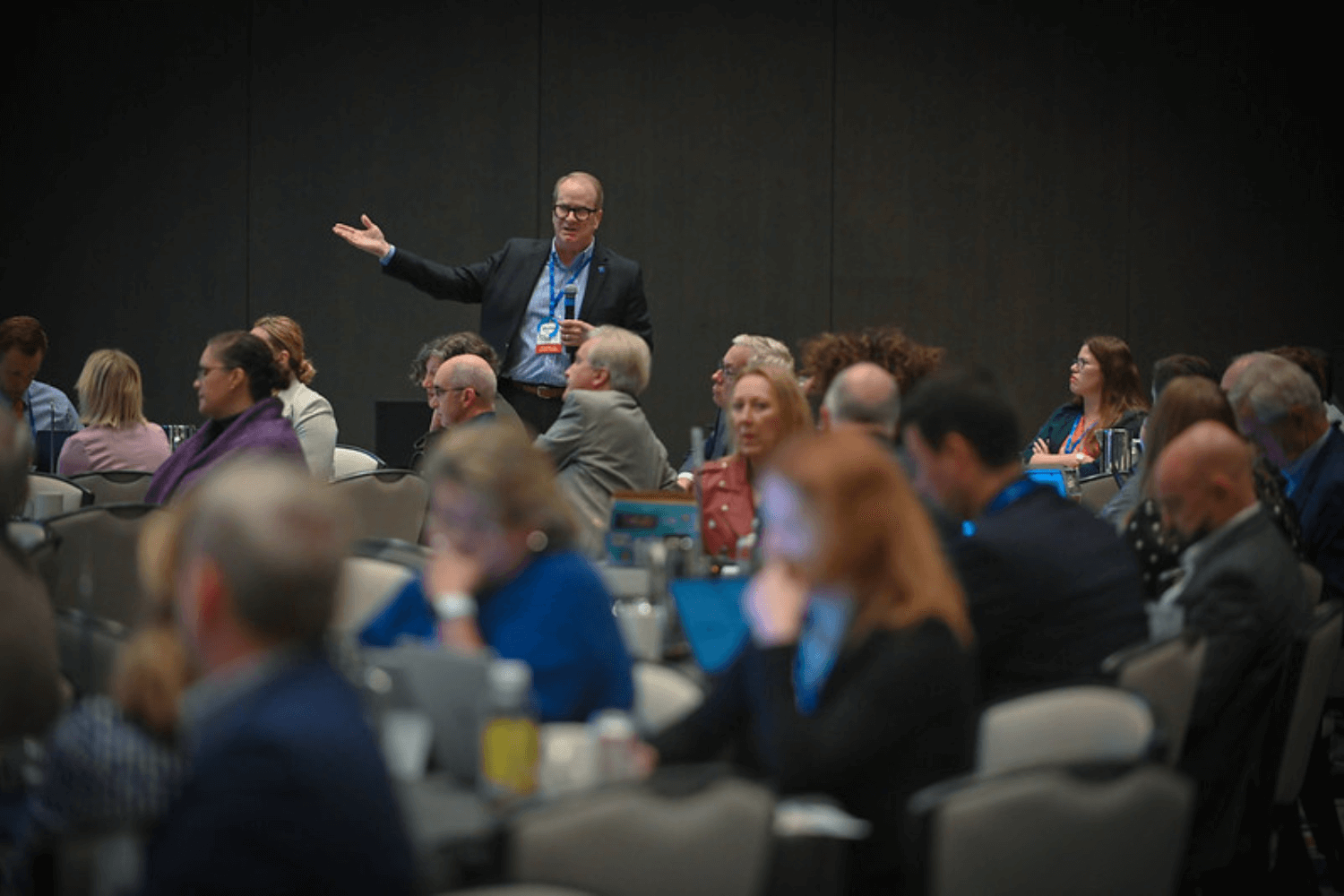 A participant sharing his knowledge with the audience
