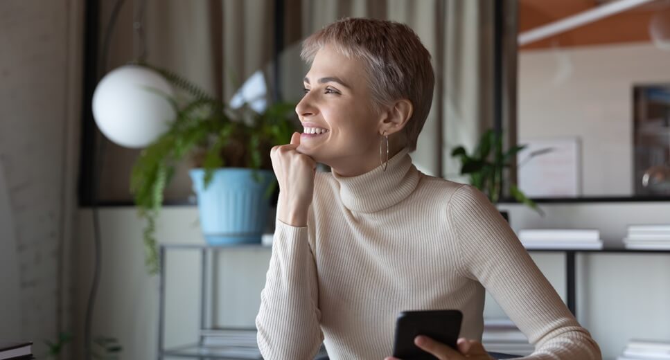 Woman smiling and thinking