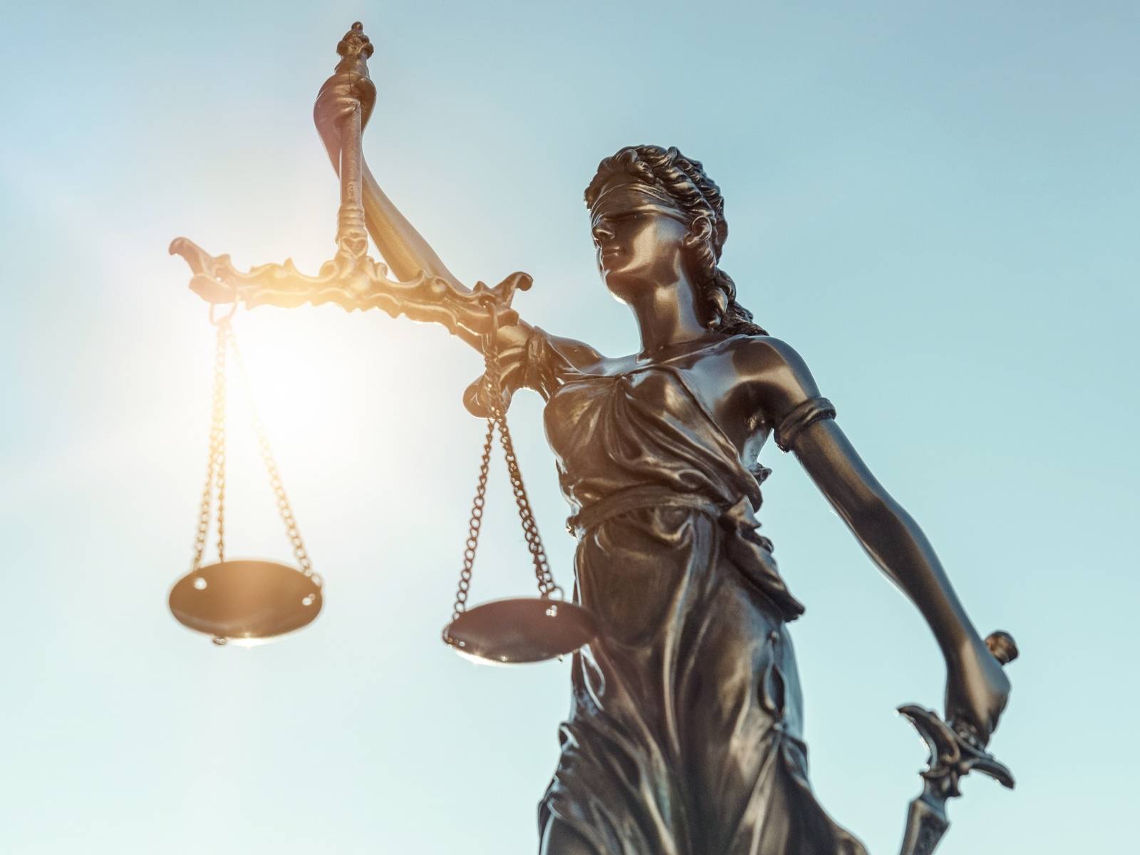 Statue of Justice shining on daytime