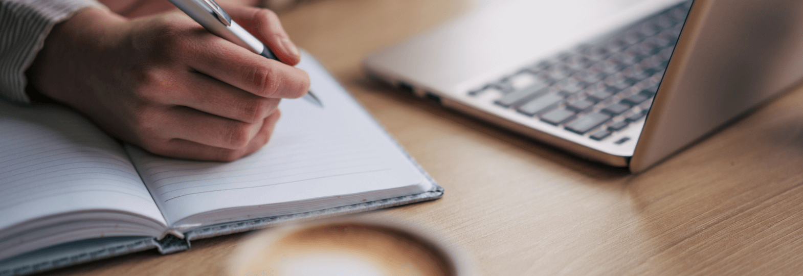 Assortment of DRI-branded legal publications standing upright, highlighting practice-focused books and periodicals.