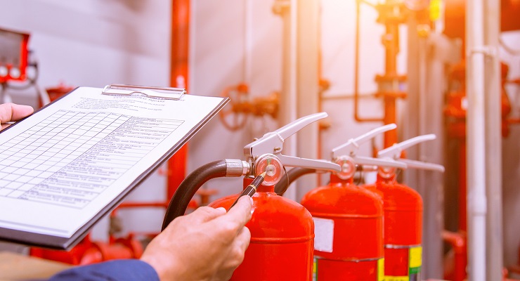 Conducting fire extinguisher inspection