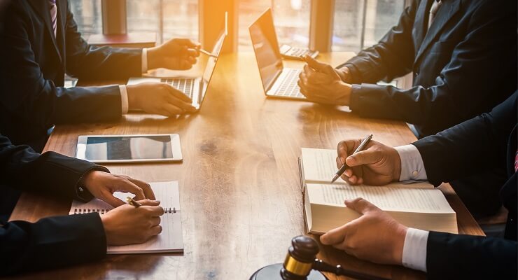Litigation skills attorneys in meeting