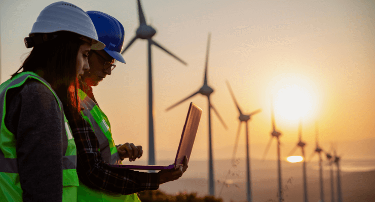 Renewable Energy workers near wind turbines
