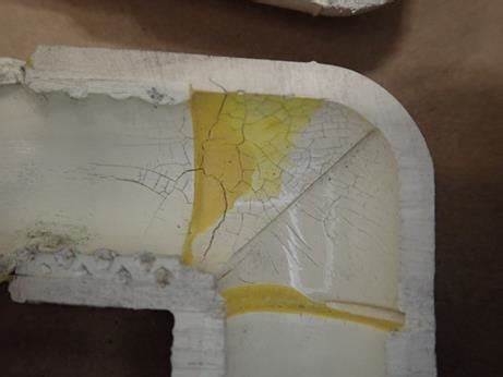 Interior cracking on CPVC joint exposed to POE oil